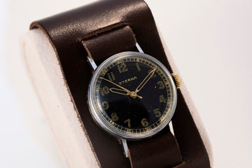 Eterna military vintage watch Cal. 520S, black gilt dial, Bauhaus design, rare collectible timepiece