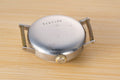 Side profile of Eterna military vintage watch, Cal. 520S, unique Bauhaus design, historical significance
