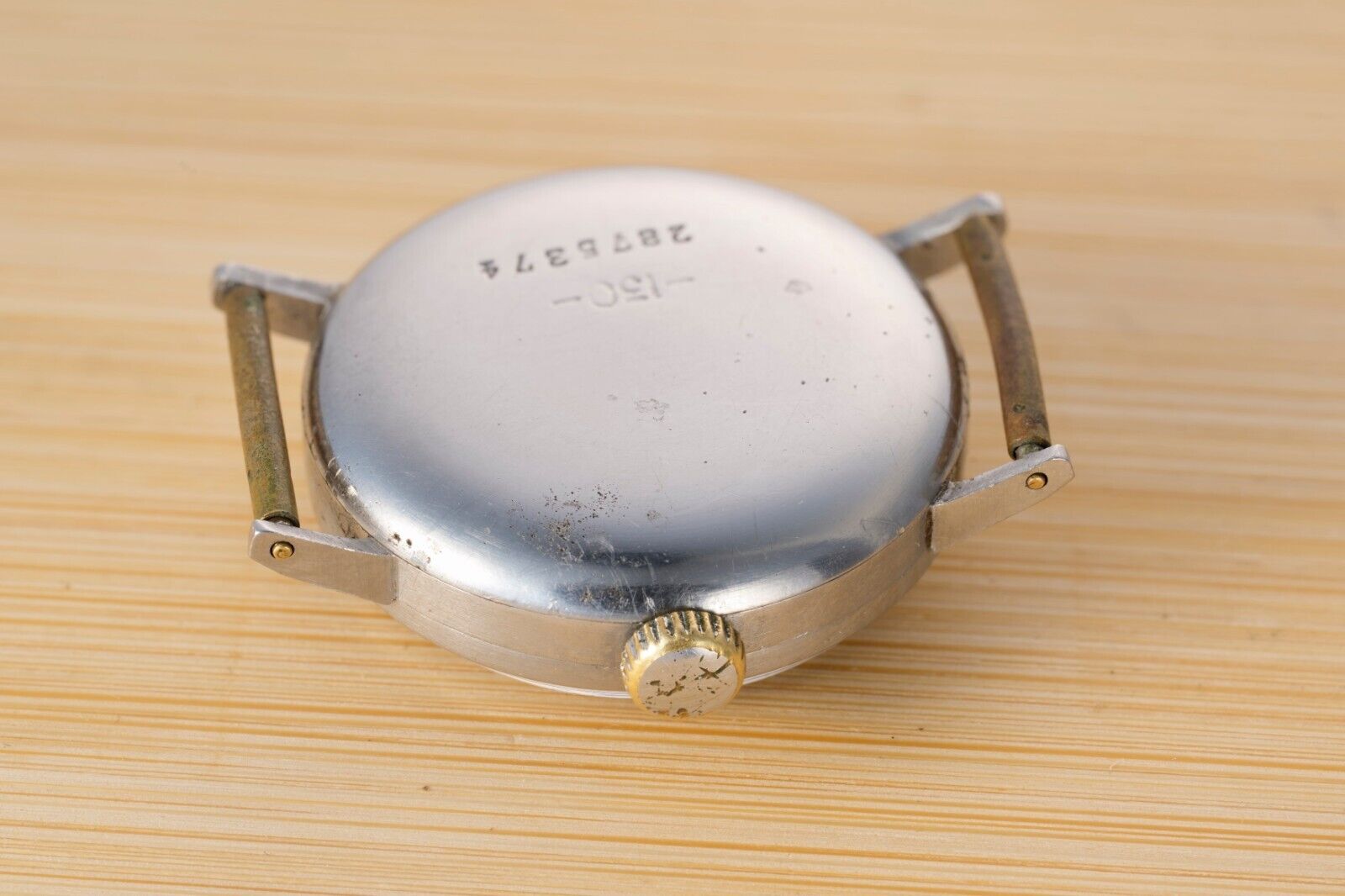 Side profile of Eterna military vintage watch, Cal. 520S, unique Bauhaus design, historical significance