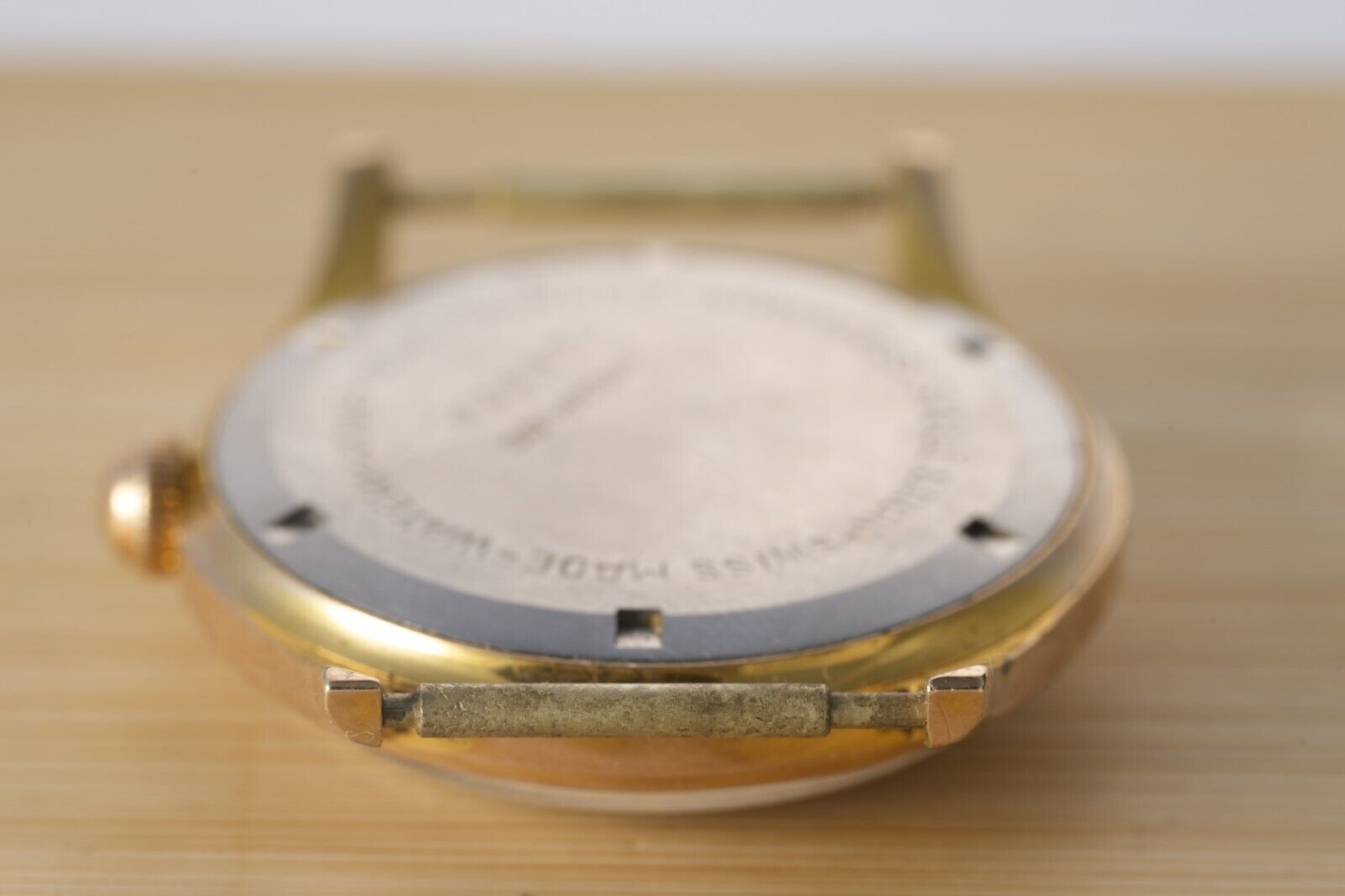 Moser & Co. Vintage Watch Movement on Workbench